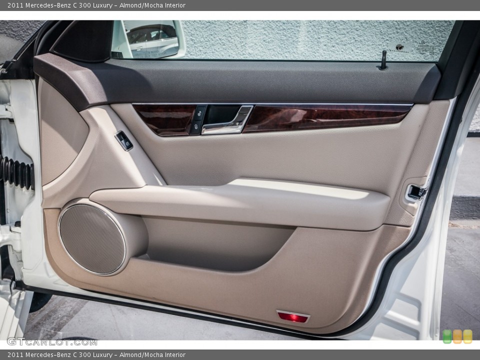 Almond/Mocha Interior Door Panel for the 2011 Mercedes-Benz C 300 Luxury #83091200