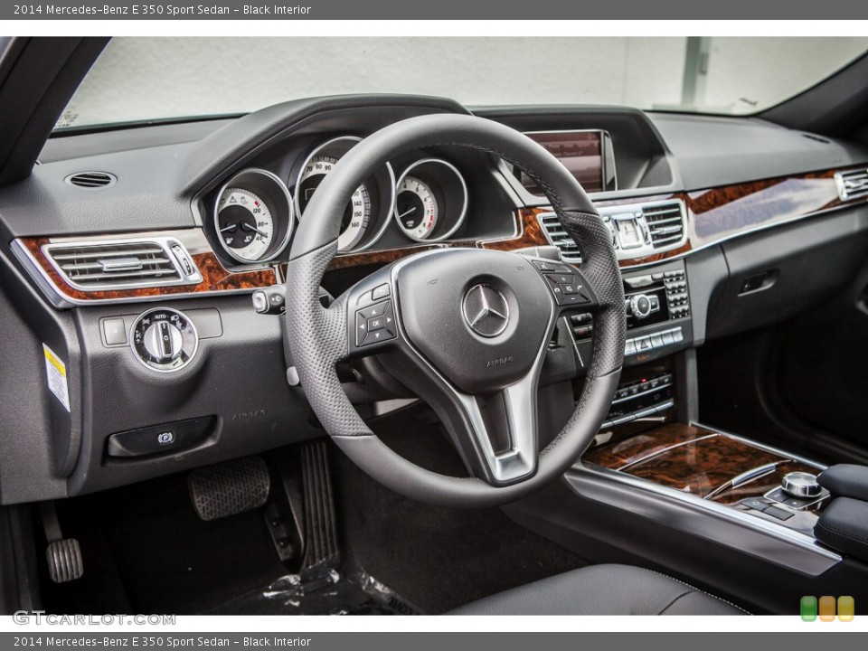 Black Interior Dashboard for the 2014 Mercedes-Benz E 350 Sport Sedan #83095713