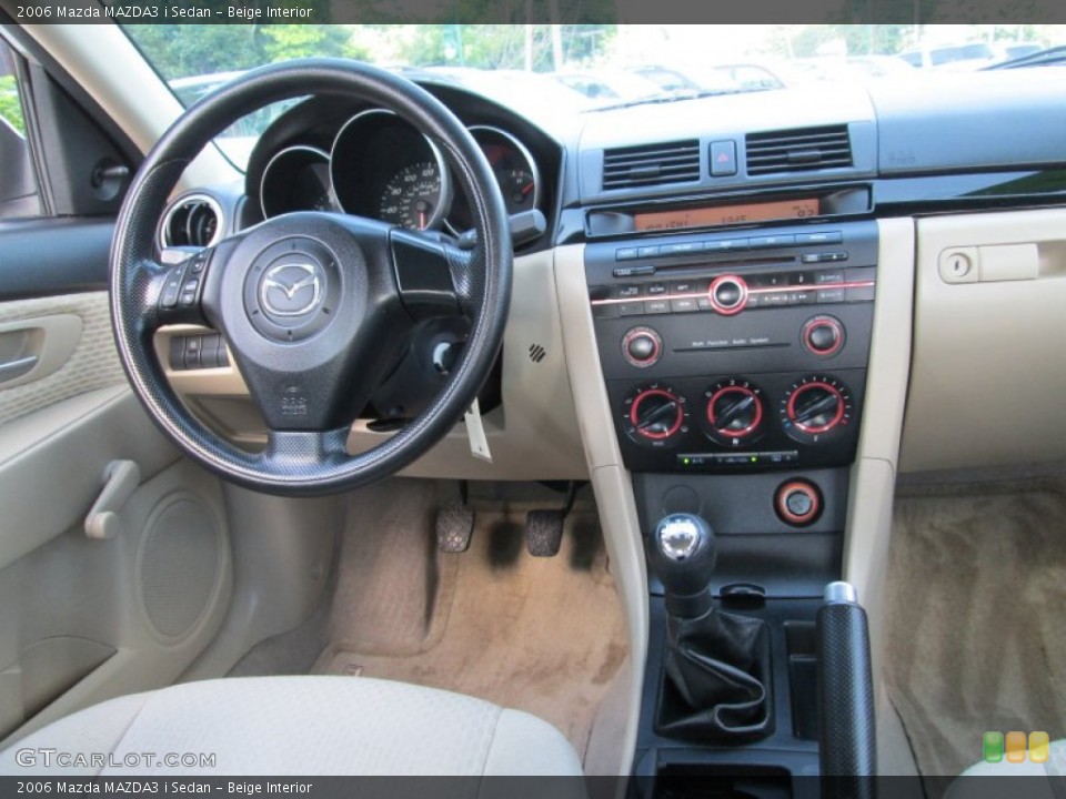 Beige Interior Dashboard for the 2006 Mazda MAZDA3 i Sedan #83123338