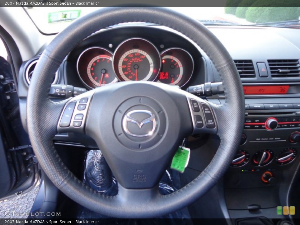 Black Interior Steering Wheel for the 2007 Mazda MAZDA3 s Sport Sedan #83129994
