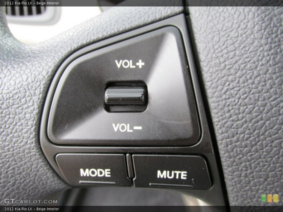 Beige Interior Controls for the 2012 Kia Rio LX #83133659