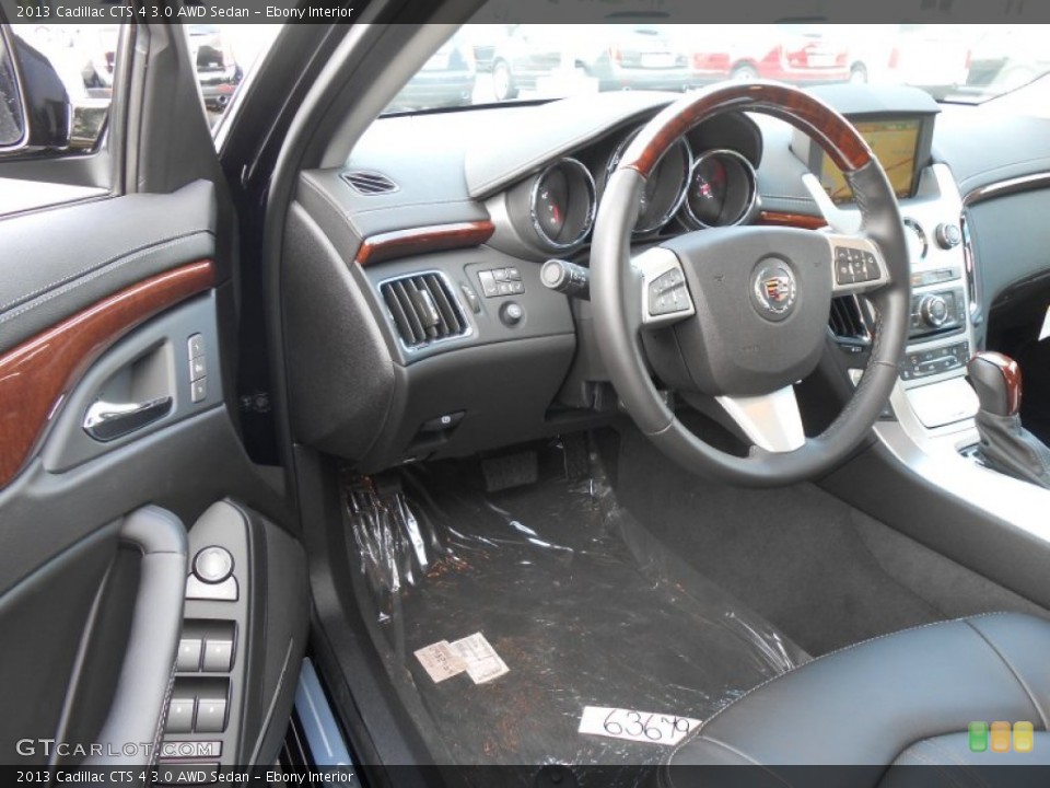 Ebony Interior Photo for the 2013 Cadillac CTS 4 3.0 AWD Sedan #83198363