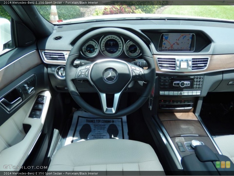 Porcelain/Black Interior Dashboard for the 2014 Mercedes-Benz E 350 Sport Sedan #83201844