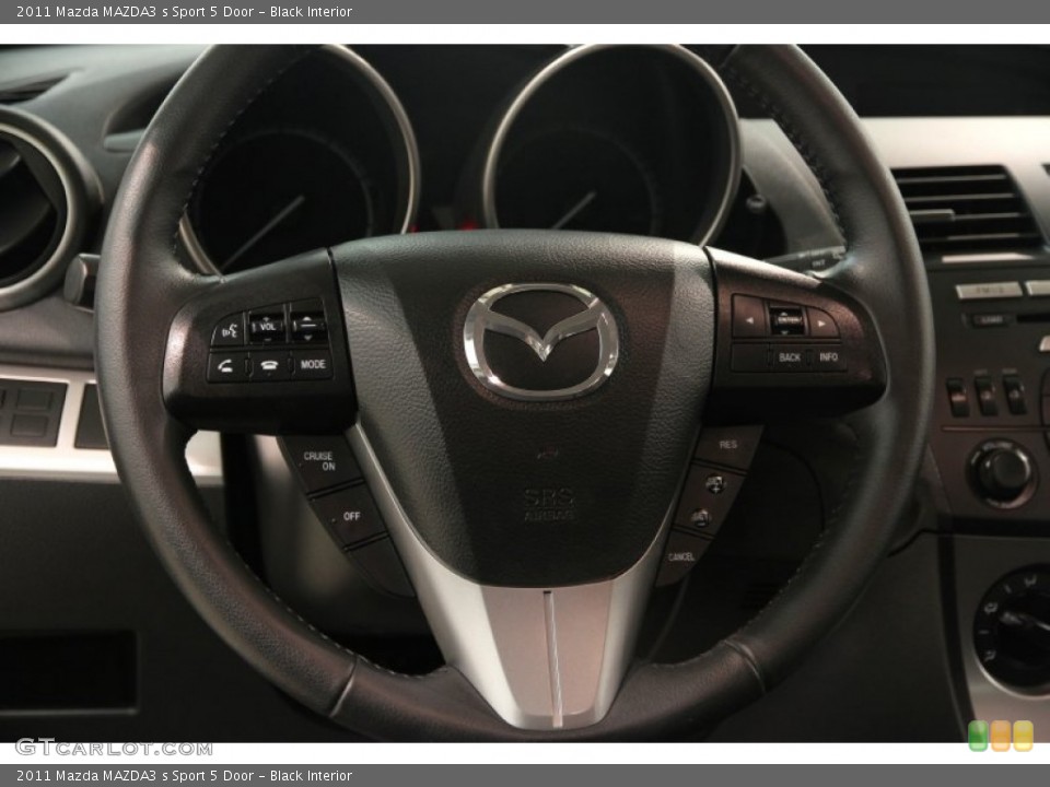 Black Interior Steering Wheel for the 2011 Mazda MAZDA3 s Sport 5 Door #83214174