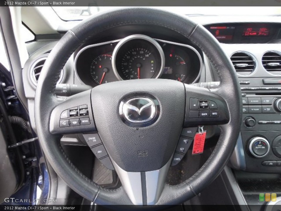 Black Interior Steering Wheel for the 2012 Mazda CX-7 i Sport #83225082