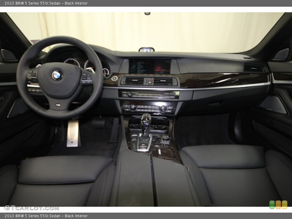Black Interior Dashboard for the 2013 BMW 5 Series 550i Sedan #83239927