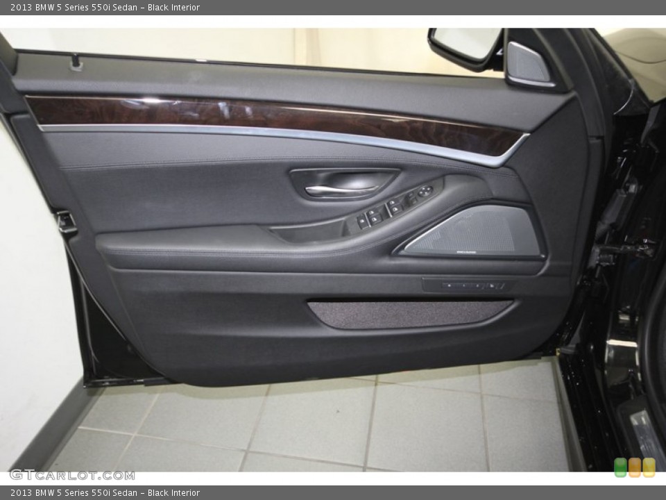 Black Interior Door Panel for the 2013 BMW 5 Series 550i Sedan #83240113