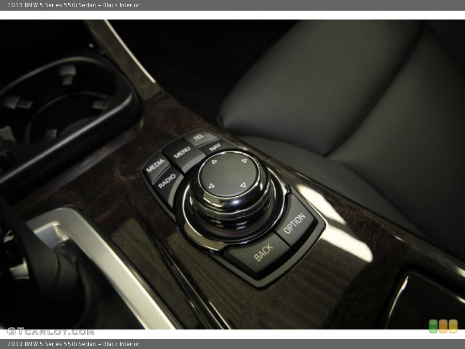Black Interior Controls for the 2013 BMW 5 Series 550i Sedan #83240361