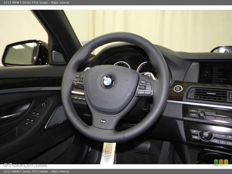 Black Interior Steering Wheel for the 2013 BMW 5 Series 550i Sedan #83240539