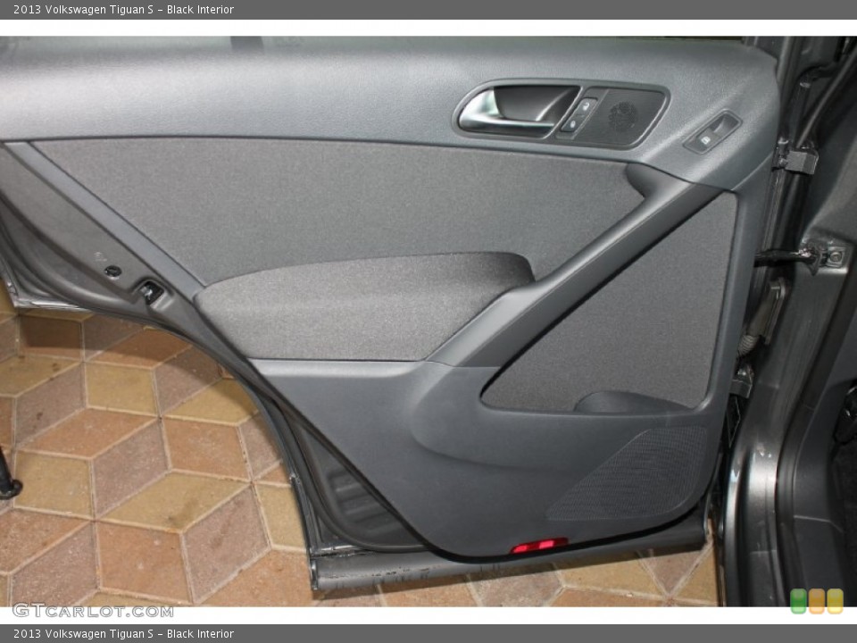 Black Interior Door Panel for the 2013 Volkswagen Tiguan S #83257385