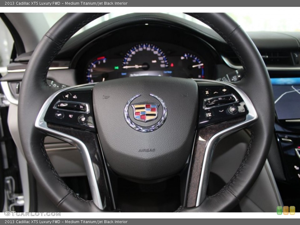 Medium Titanium/Jet Black Interior Steering Wheel for the 2013 Cadillac XTS Luxury FWD #83266982