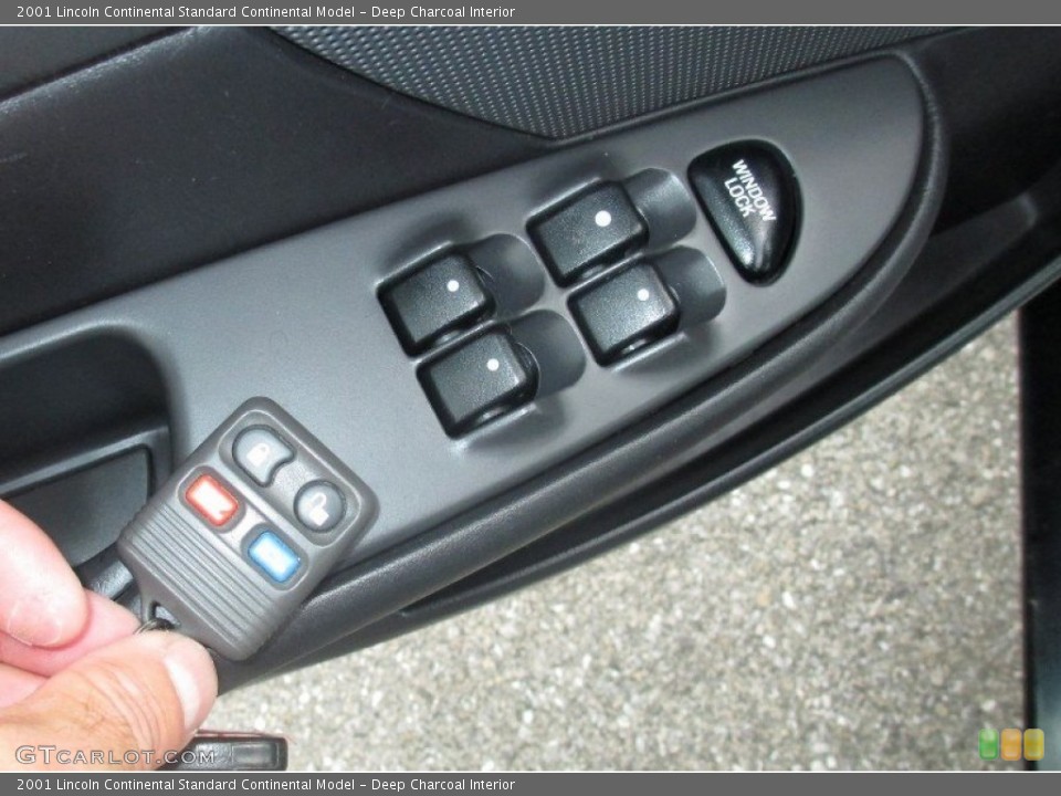 Deep Charcoal Interior Controls for the 2001 Lincoln Continental  #83273175