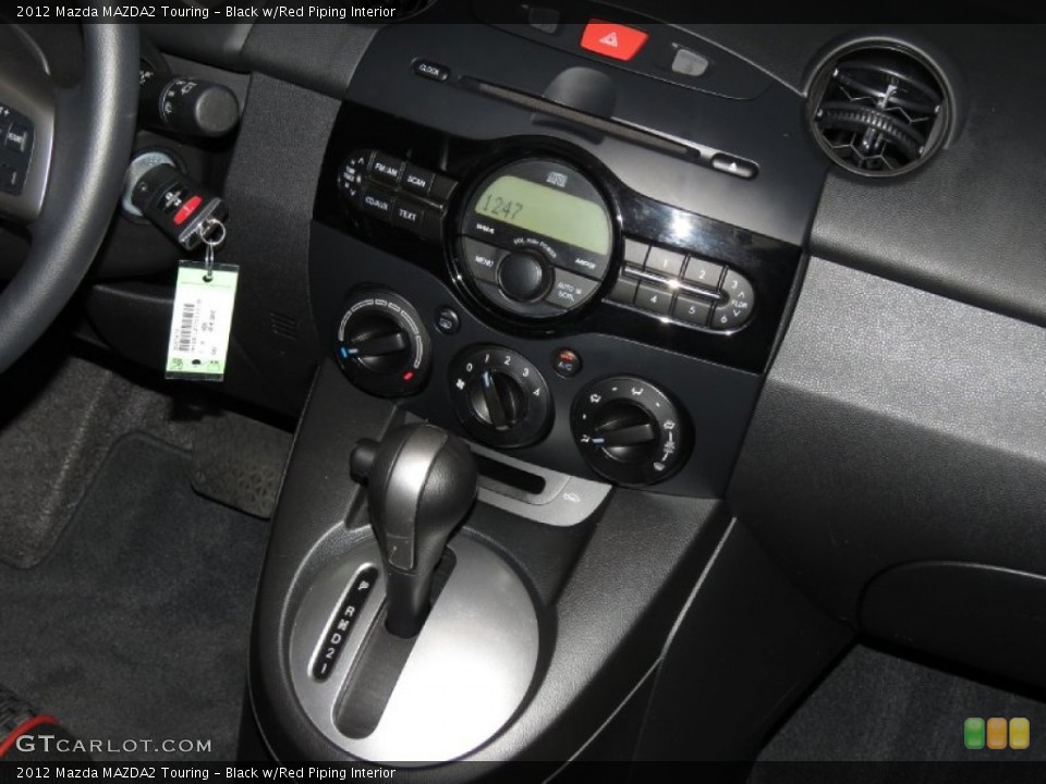 Black w/Red Piping Interior Controls for the 2012 Mazda MAZDA2 Touring #83273524