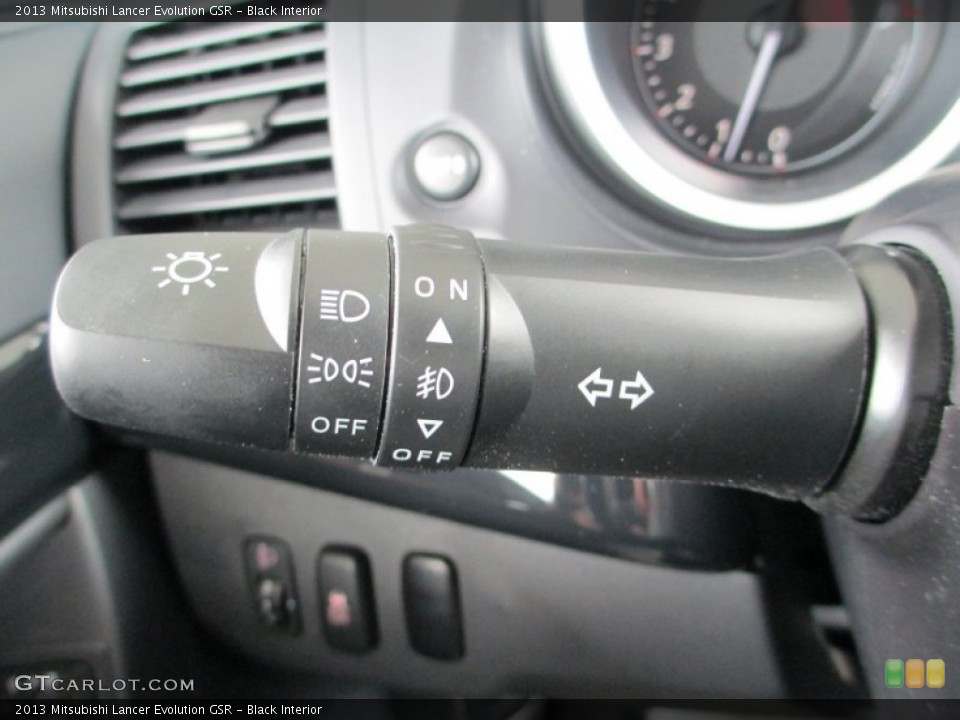Black Interior Controls for the 2013 Mitsubishi Lancer Evolution GSR #83282268