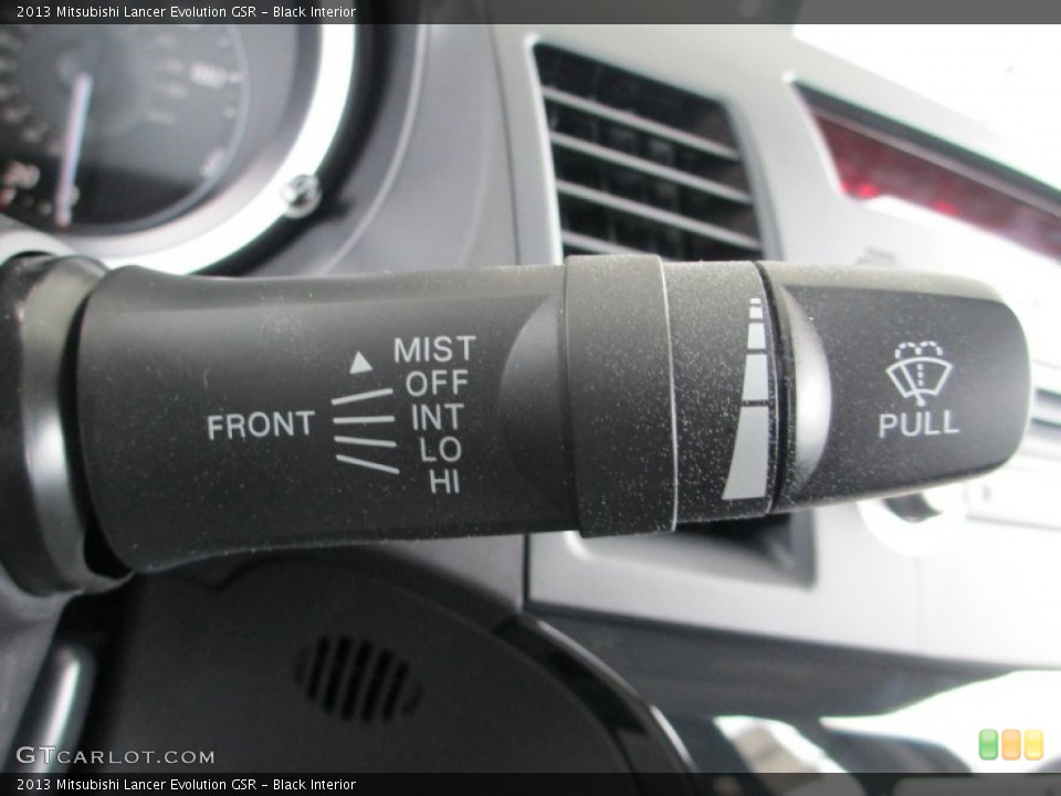 Black Interior Controls for the 2013 Mitsubishi Lancer Evolution GSR #83282309
