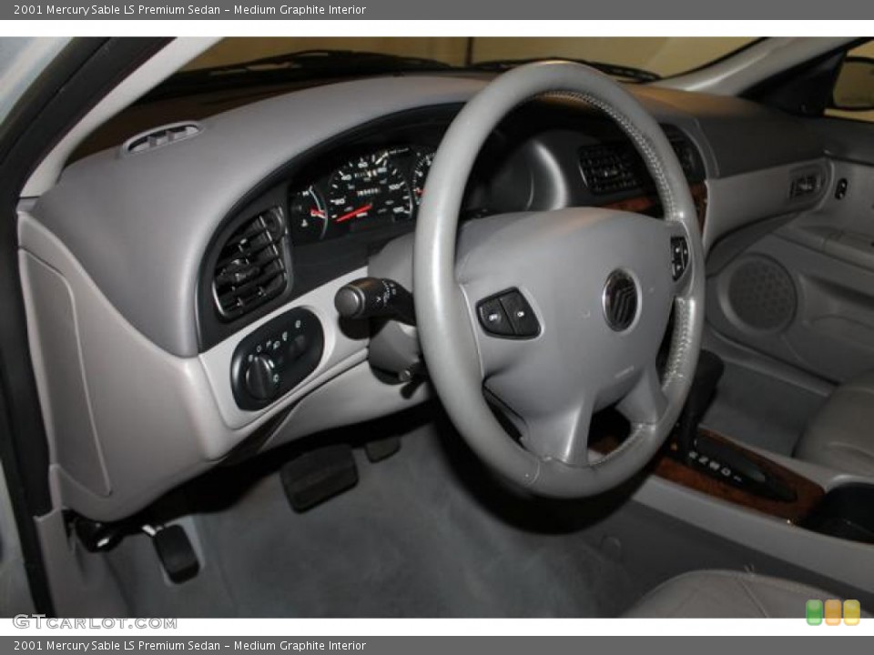 Medium Graphite Interior Steering Wheel for the 2001 Mercury Sable LS Premium Sedan #83297196
