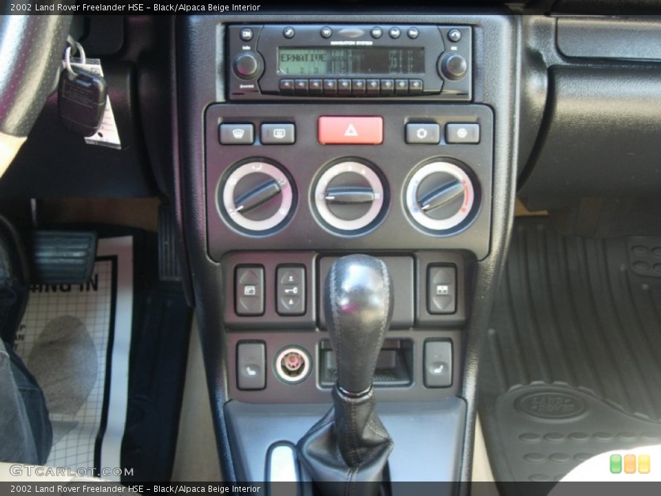 Black/Alpaca Beige Interior Controls for the 2002 Land Rover Freelander HSE #83301672