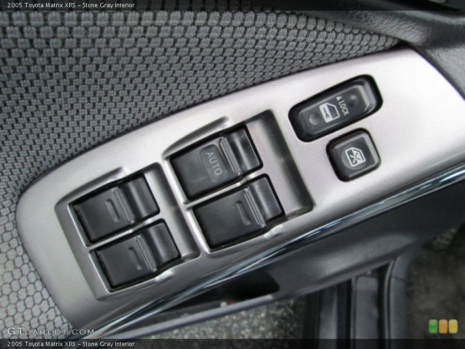 Stone Gray Interior Controls for the 2005 Toyota Matrix XRS #83329630