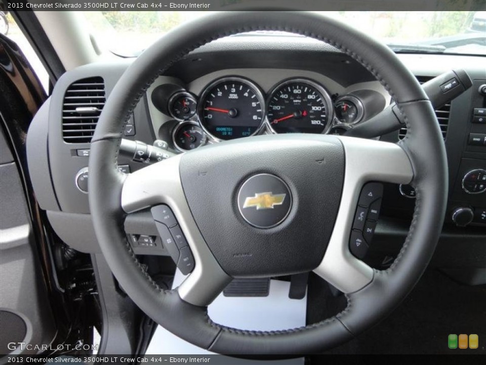 Ebony Interior Steering Wheel for the 2013 Chevrolet Silverado 3500HD LT Crew Cab 4x4 #83336521