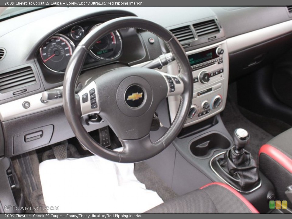 Ebony/Ebony UltraLux/Red Pipping Interior Dashboard for the 2009 Chevrolet Cobalt SS Coupe #83356086