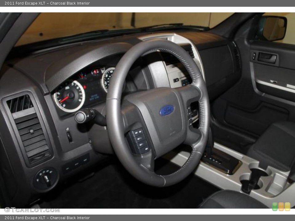 Charcoal Black Interior Steering Wheel for the 2011 Ford Escape XLT #83357185