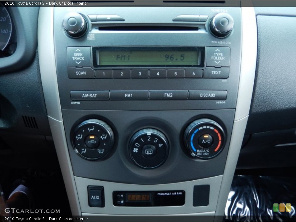 Dark Charcoal Interior Controls for the 2010 Toyota Corolla S #83383045