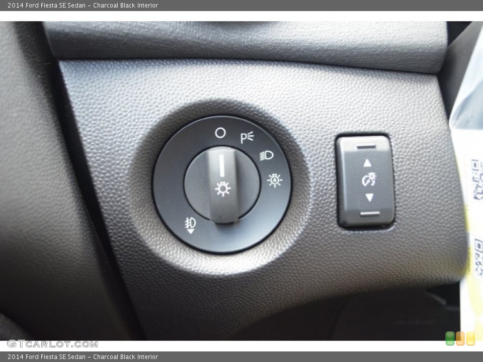 Charcoal Black Interior Controls for the 2014 Ford Fiesta SE Sedan #83383107