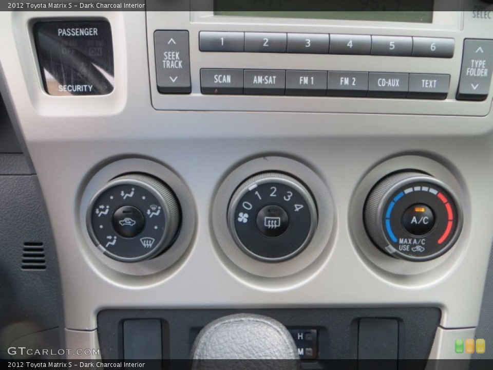 Dark Charcoal Interior Controls for the 2012 Toyota Matrix S #83429833