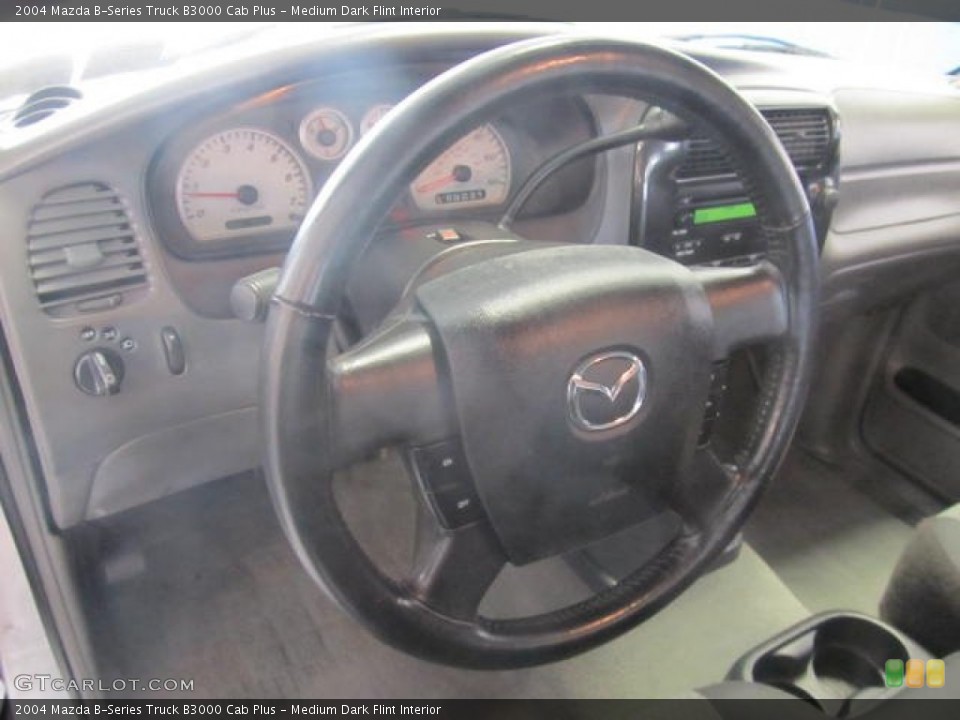 Medium Dark Flint Interior Steering Wheel for the 2004 Mazda B-Series Truck B3000 Cab Plus #83431609