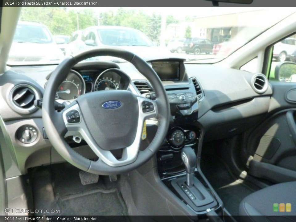 Charcoal Black Interior Dashboard for the 2014 Ford Fiesta SE Sedan #83433400