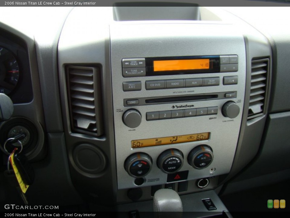 Steel Gray Interior Controls for the 2006 Nissan Titan LE Crew Cab #83437363