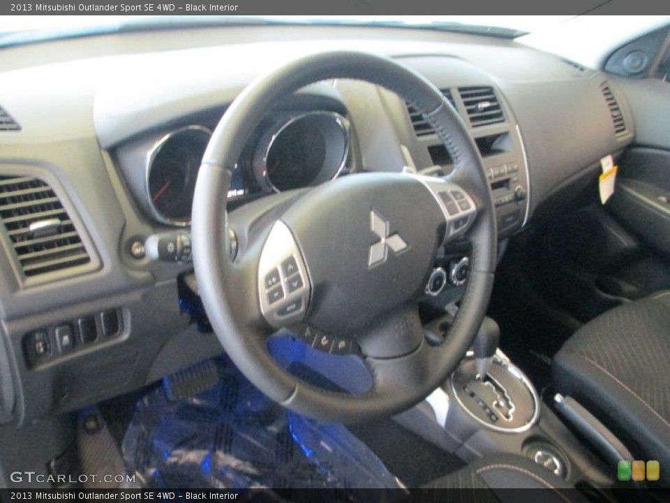 Black Interior Dashboard for the 2013 Mitsubishi Outlander Sport SE 4WD #83438941