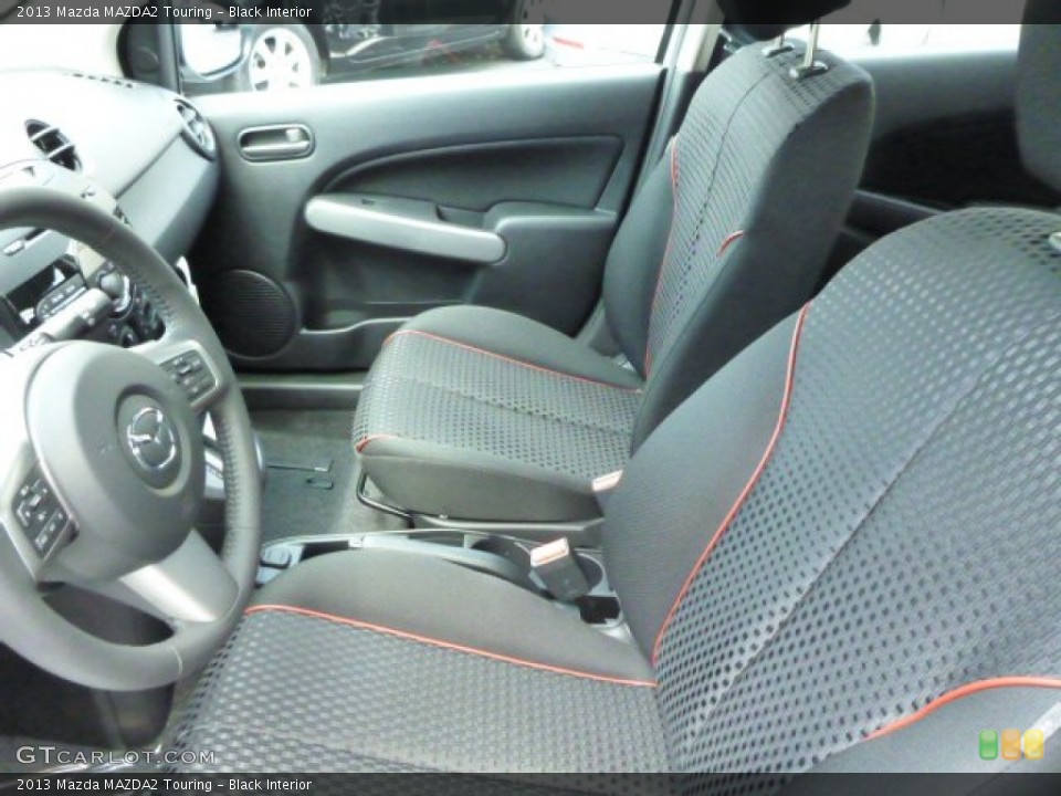 Black Interior Front Seat for the 2013 Mazda MAZDA2 Touring #83445871