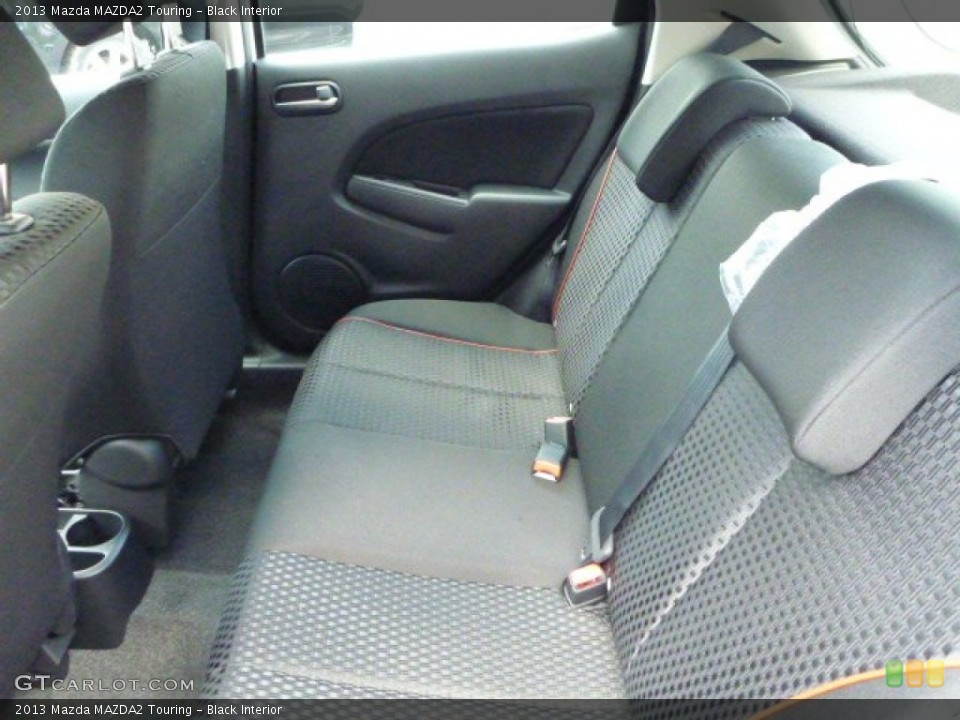 Black Interior Rear Seat for the 2013 Mazda MAZDA2 Touring #83445892