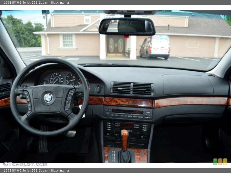 Black Interior Dashboard for the 1998 BMW 5 Series 528i Sedan #83448700