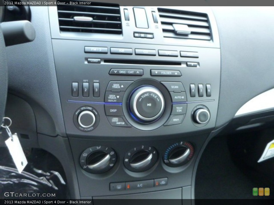 Black Interior Controls for the 2013 Mazda MAZDA3 i Sport 4 Door #83488519