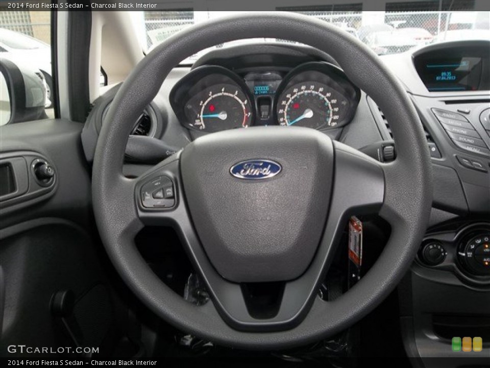 Charcoal Black Interior Steering Wheel for the 2014 Ford Fiesta S Sedan #83494015
