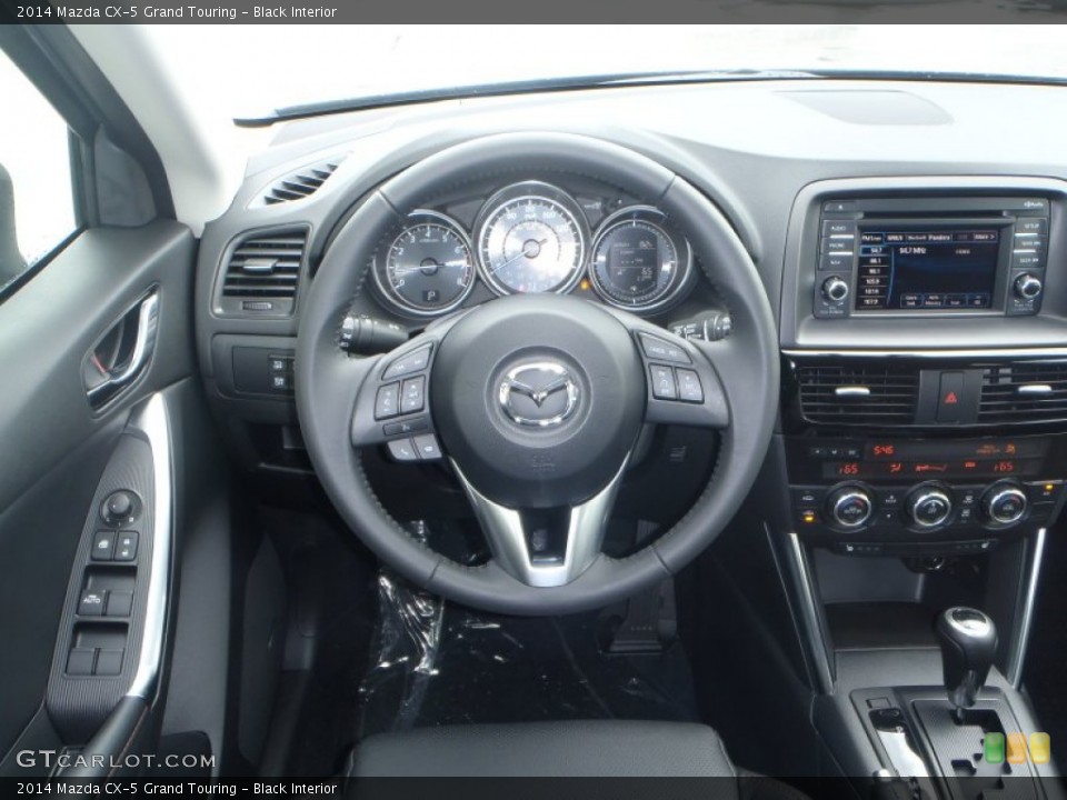 Black Interior Controls for the 2014 Mazda CX-5 Grand Touring #83504406