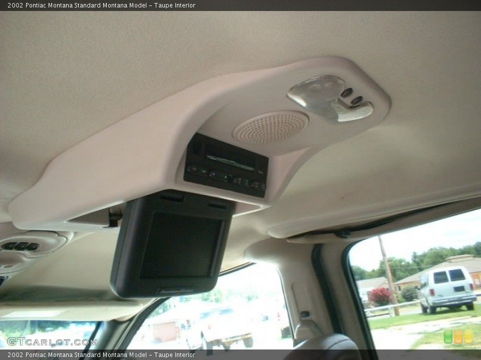 Taupe Interior Entertainment System for the 2002 Pontiac Montana  #83517531