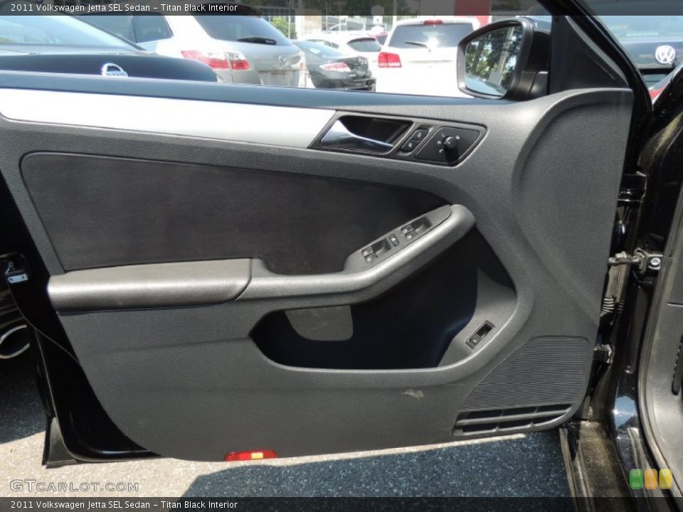 Titan Black Interior Door Panel for the 2011 Volkswagen Jetta SEL Sedan #83540157