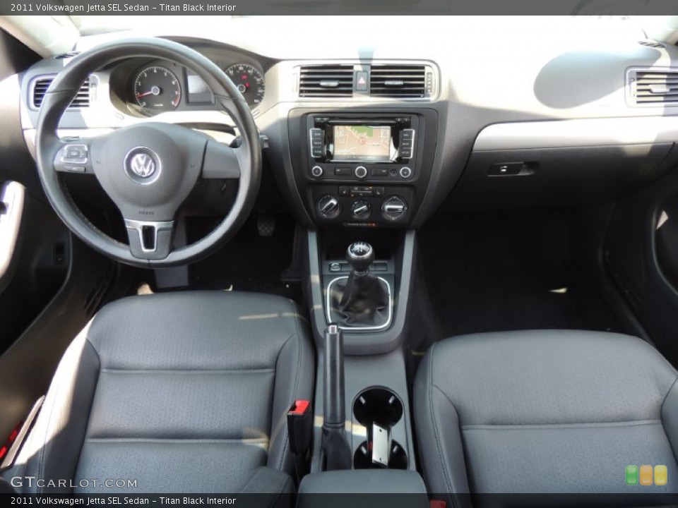 Titan Black Interior Dashboard for the 2011 Volkswagen Jetta SEL Sedan #83540259