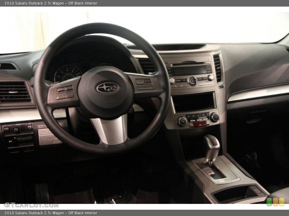 Off Black Interior Dashboard for the 2010 Subaru Outback 2.5i Wagon #83545026