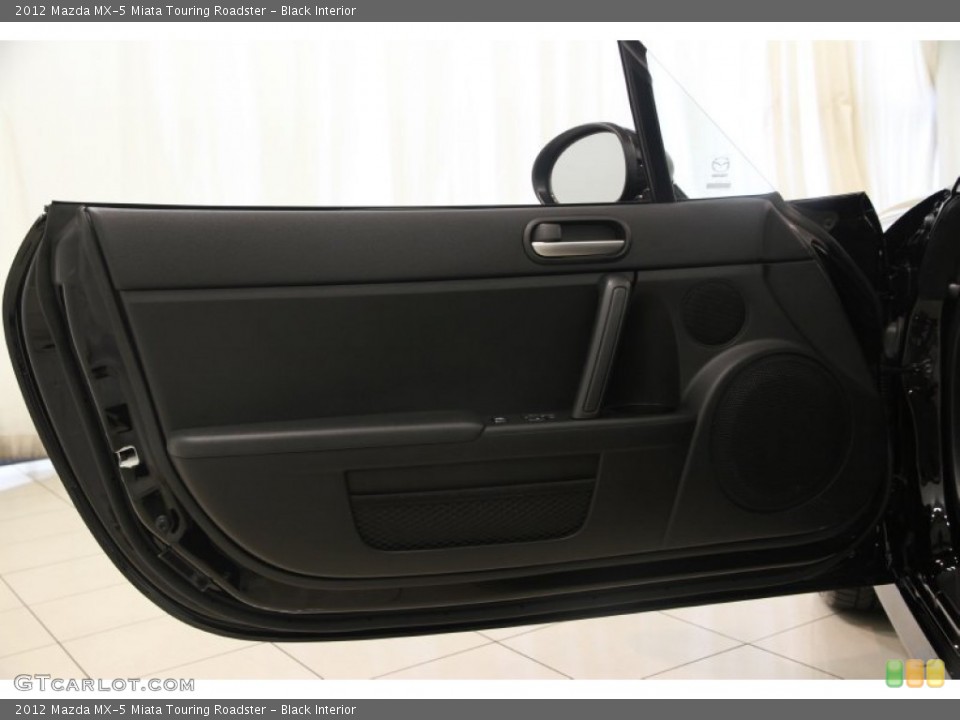 Black Interior Door Panel for the 2012 Mazda MX-5 Miata Touring Roadster #83547687