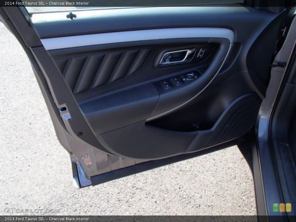 Charcoal Black Interior Door Panel for the 2014 Ford Taurus SEL #83574154