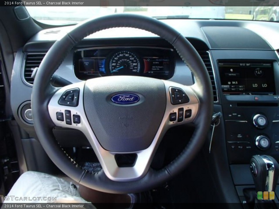 Charcoal Black Interior Steering Wheel for the 2014 Ford Taurus SEL #83574369