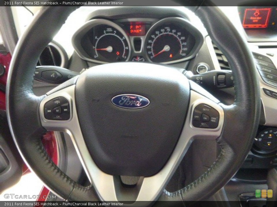 Plum/Charcoal Black Leather Interior Steering Wheel for the 2011 Ford Fiesta SES Hatchback #83649811