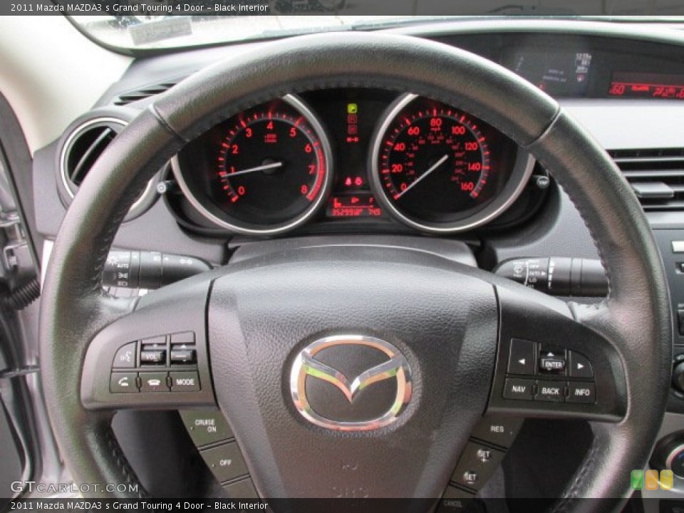 Black Interior Steering Wheel for the 2011 Mazda MAZDA3 s Grand Touring 4 Door #83699434