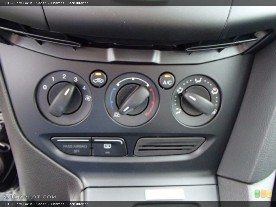 Charcoal Black Interior Controls for the 2014 Ford Focus S Sedan #83722171