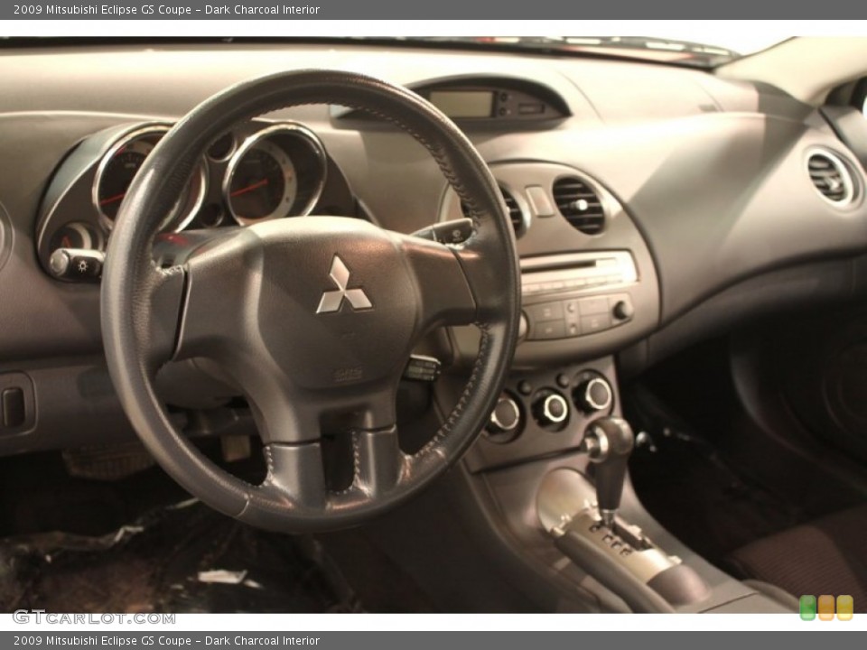 Dark Charcoal Interior Dashboard for the 2009 Mitsubishi Eclipse GS Coupe #83725621