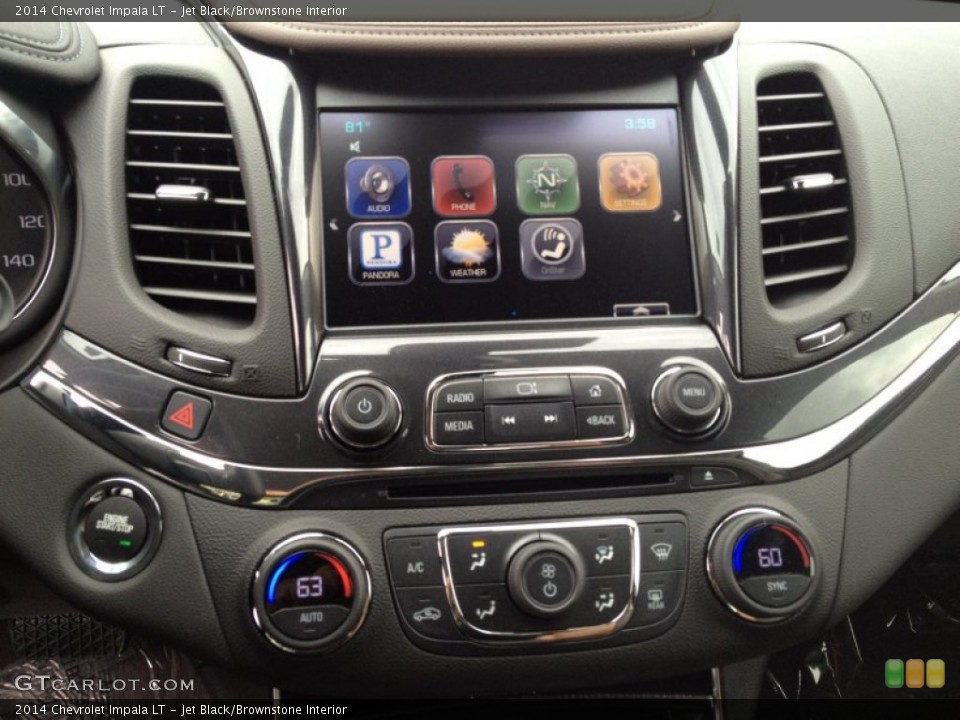 Jet Black/Brownstone Interior Controls for the 2014 Chevrolet Impala LT #83729602